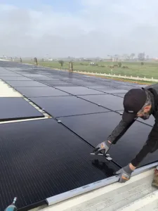 Precise mounting of PV modules on rooftop structure, ensuring alignment, secure fixing, and compliance with mechanical load requirements.